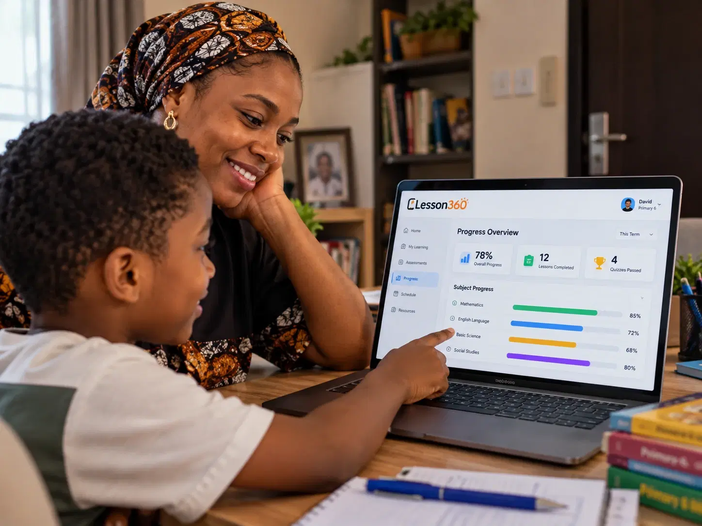 A mother and son checking his progress on the Lesson360 dashboard